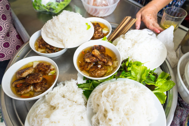 Dip the noodles into the sauce, add fresh veggies and chillies and there you have a perfect-looking bowl of Bun Cha